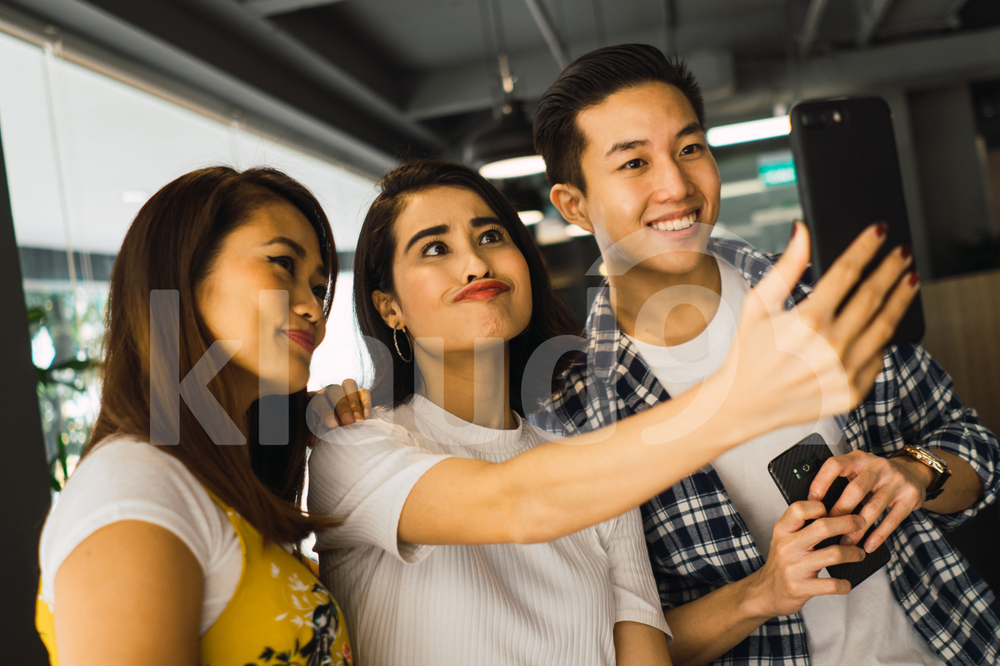 Asian millennials taking selfie