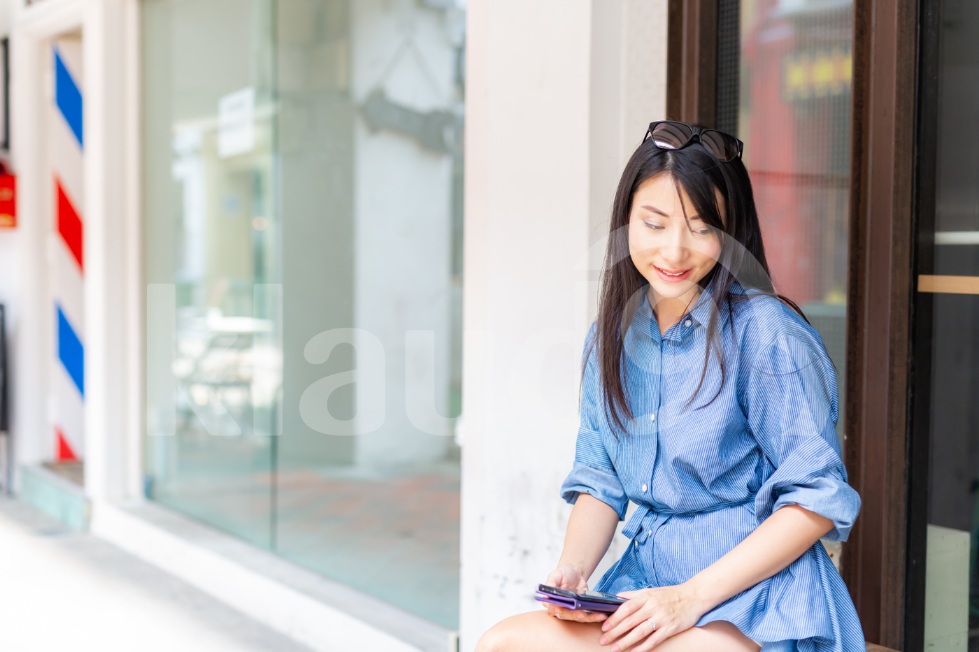 Woman sitting outdoors