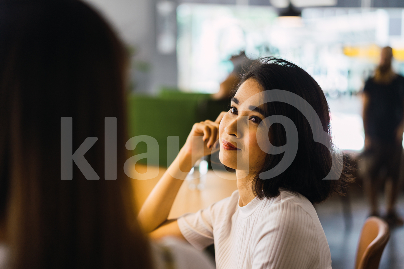Asian women sitting in the office