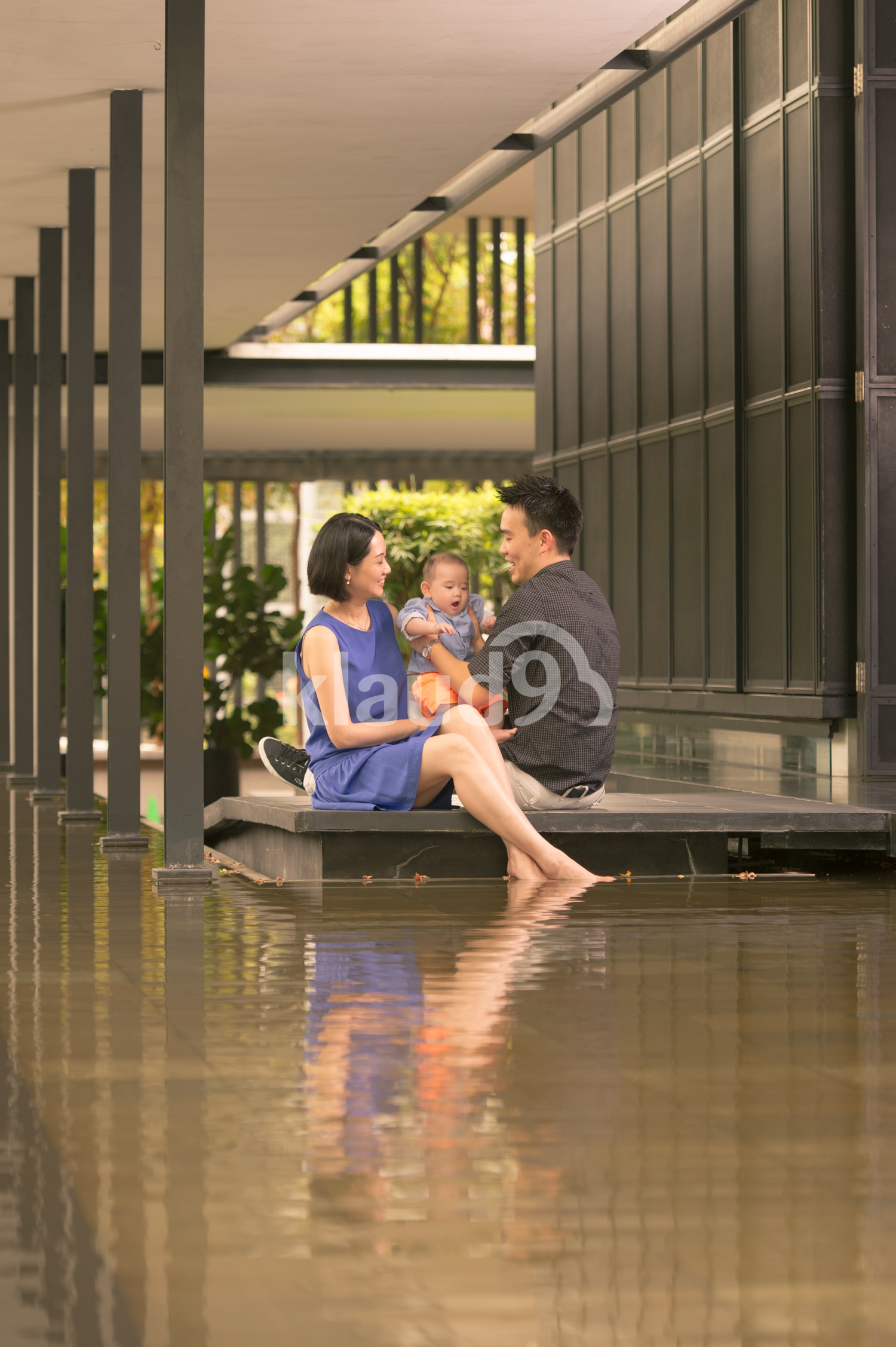 Young  Chinese parents with 5 month old son