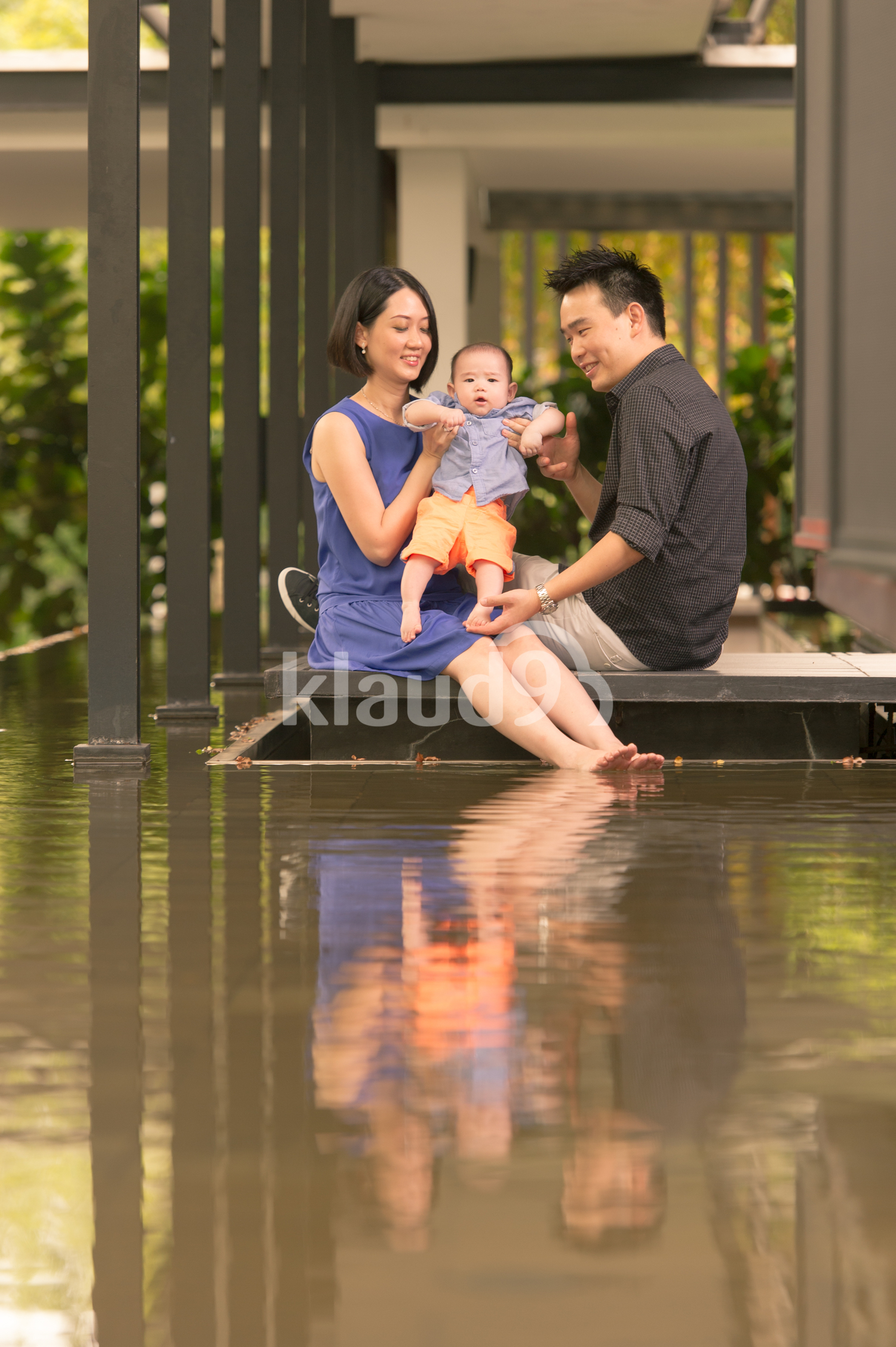 Happy Chinese family with a Baby