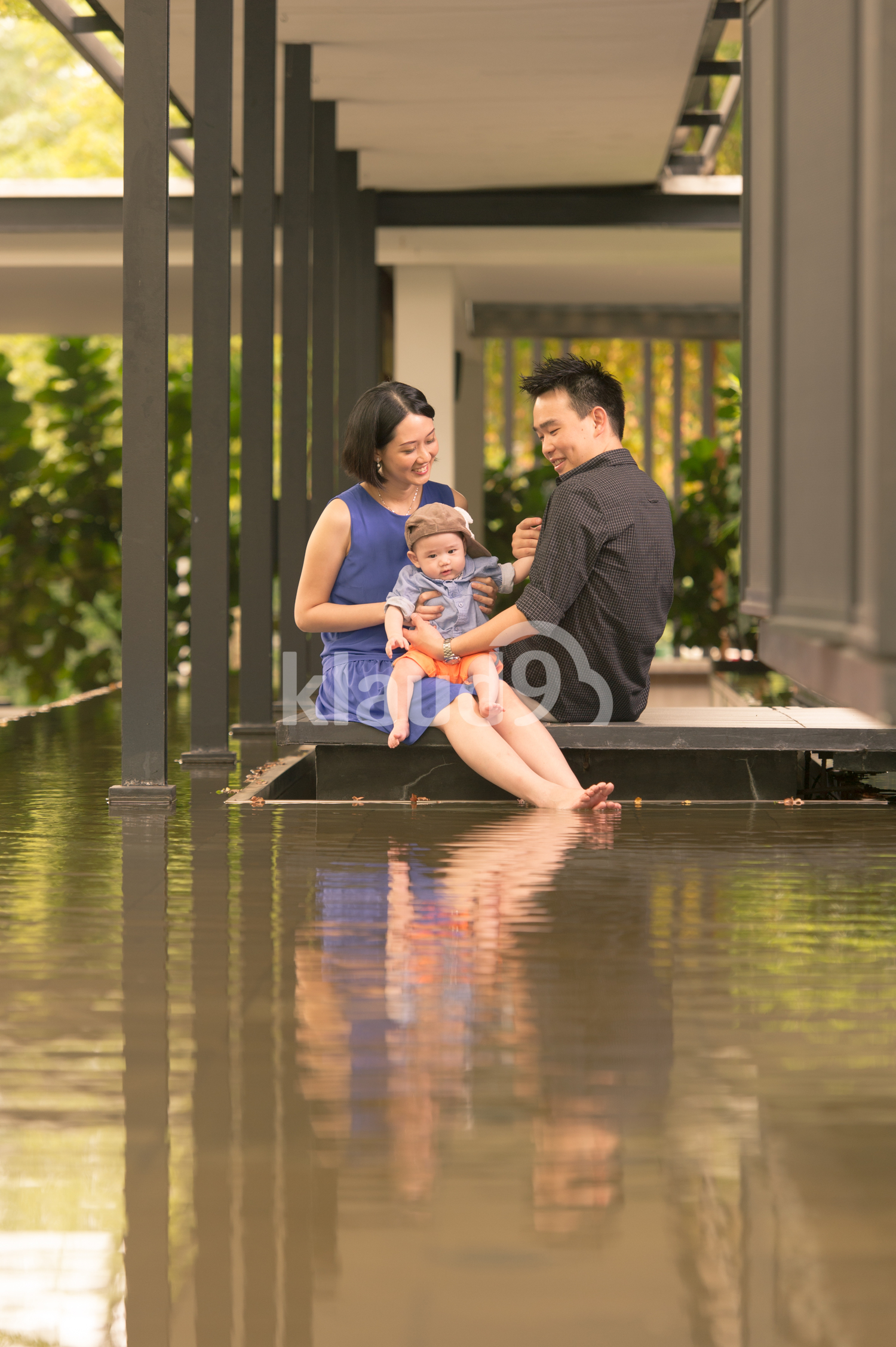Chinese family by the pool