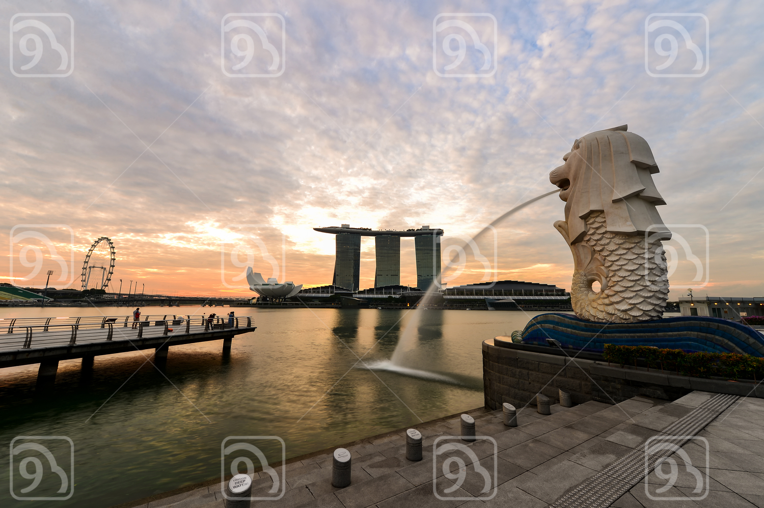Sunrise in the morning at Merlion Park, Singapore. 