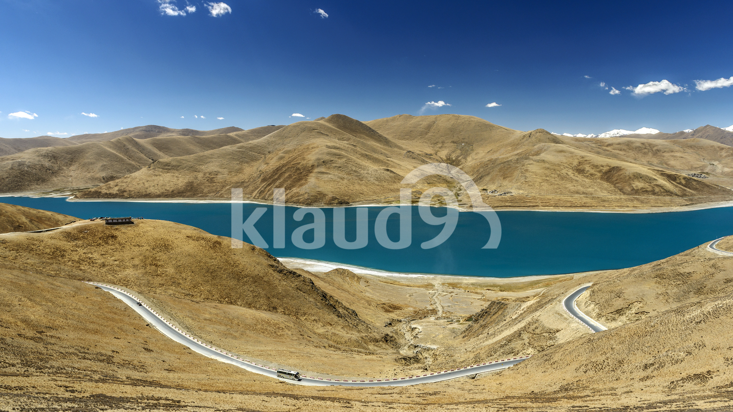 Beautiful mountains and turquoise lake at Yamdrok Lake, Tibet , China