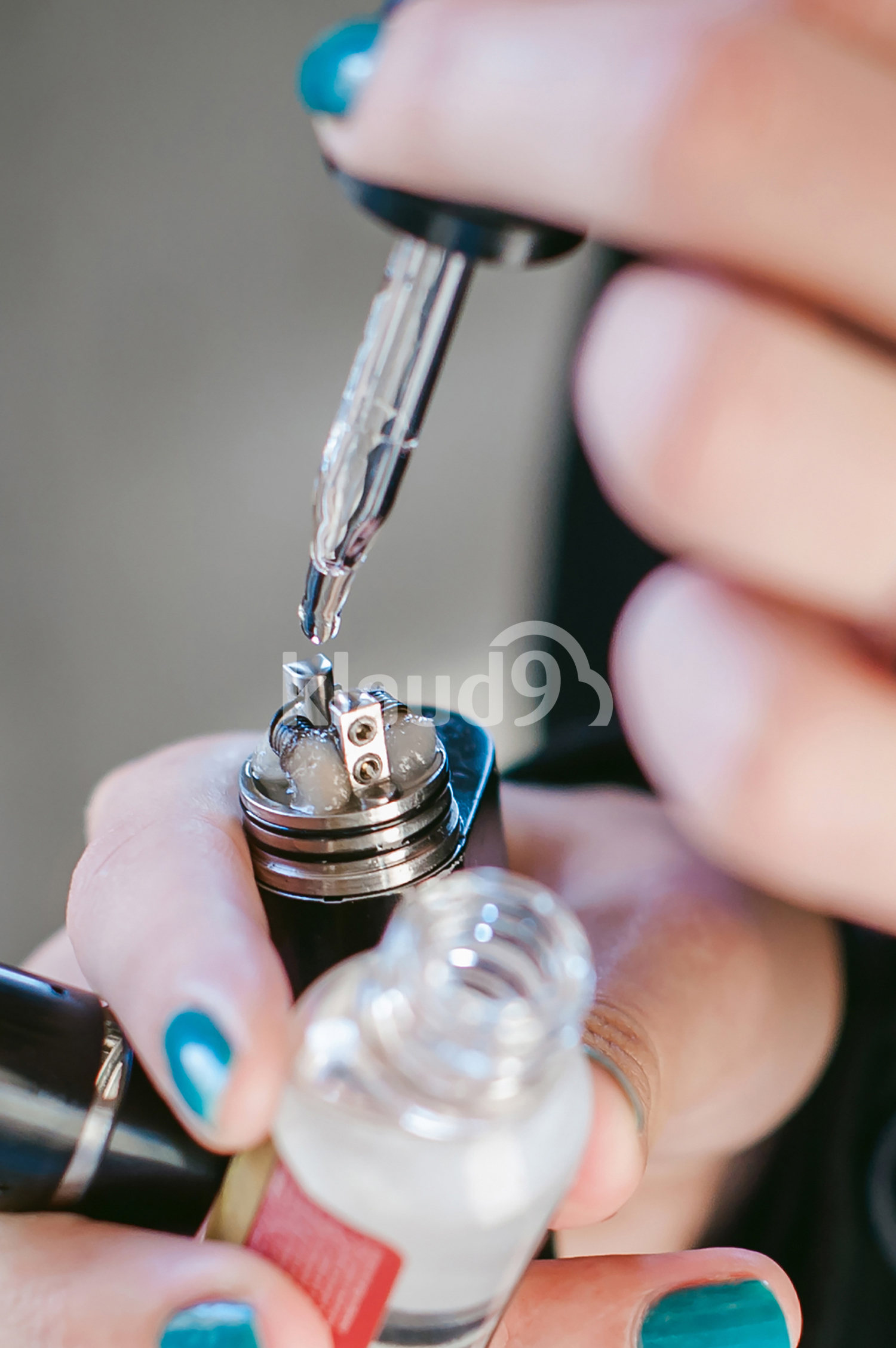 Close up of a electronic vaporiser being refilled