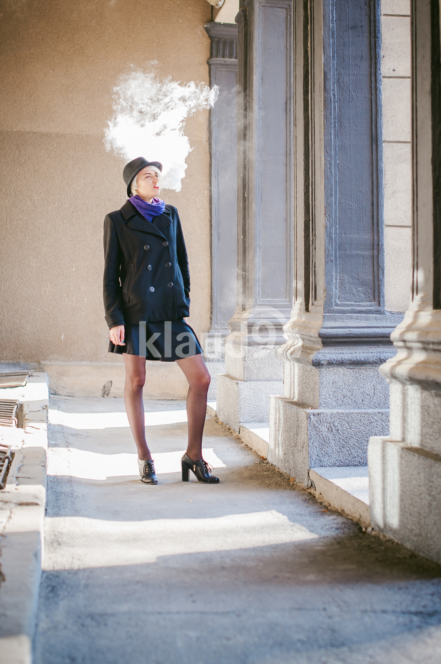 Portrait of a caucasian lady vaping