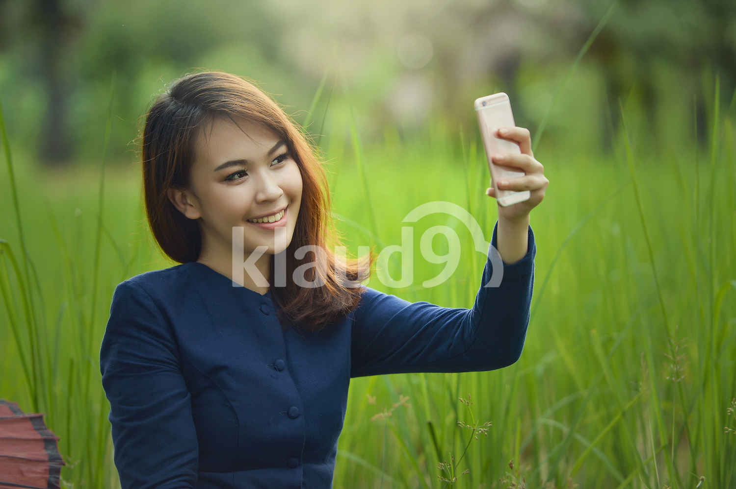 Thai female villager shooting a selfie