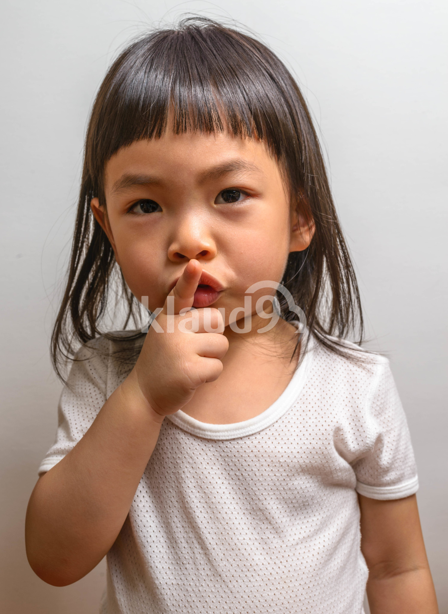 Little girl with gesture