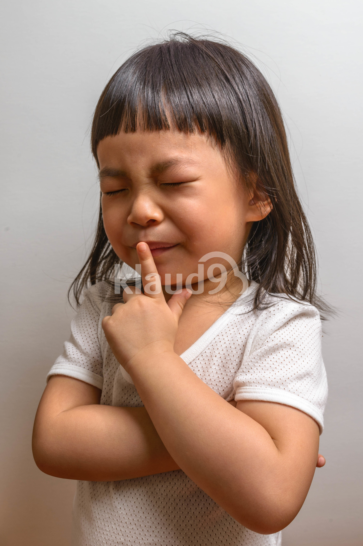 Little girl with gesture