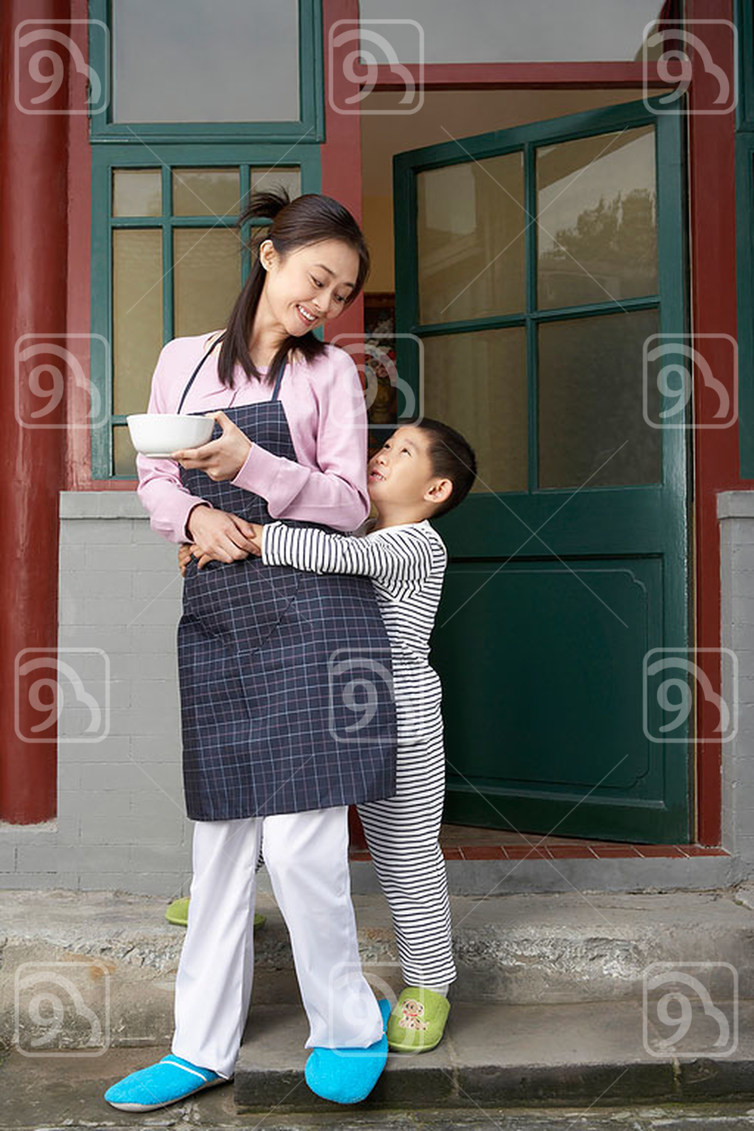 Chinese Boy Hugging Mother Round Waist 