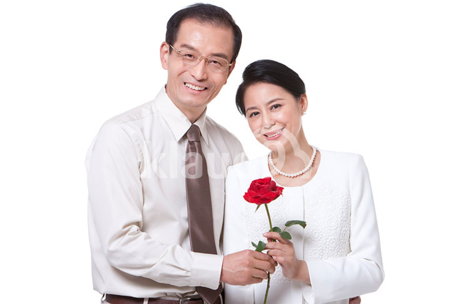 Sweet mature Chinese couple with rose