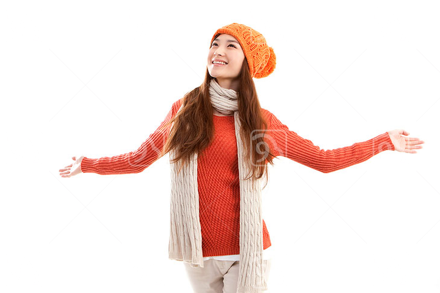 Young Chinese woman arms outstretched 