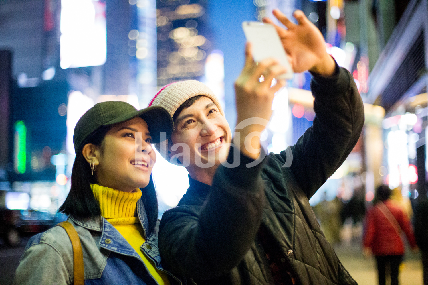 Asian tourists take a selfie in Time Square