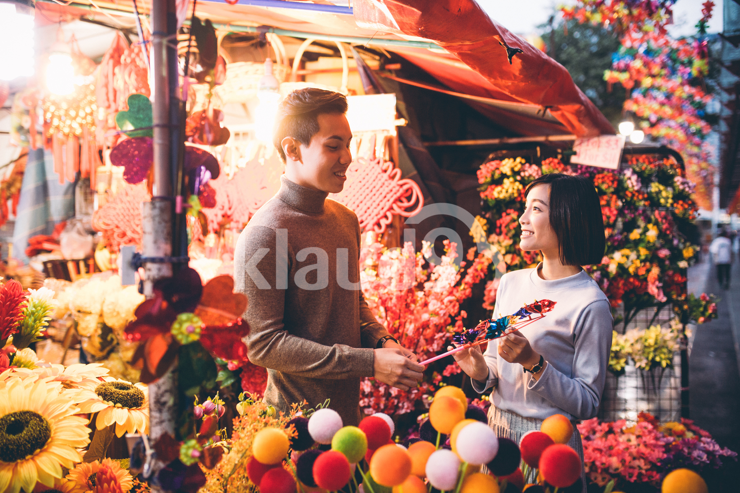 Lovely couple shopping in Chinatown over Chinese New Year