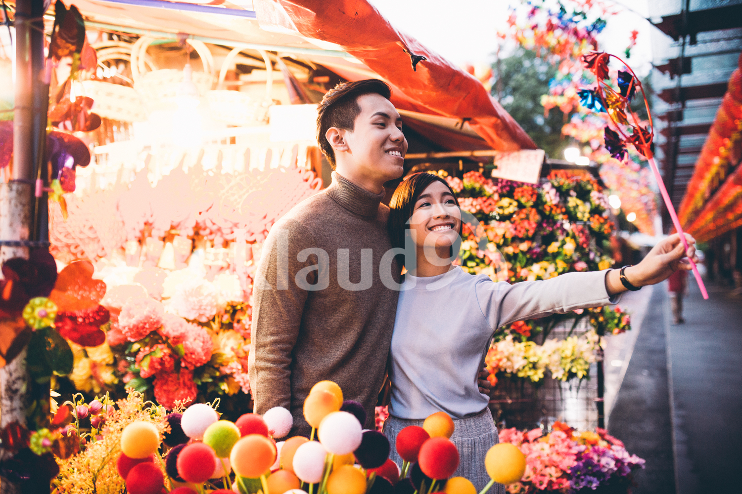 Young couple shopping in Chinatown over Chinese New Year