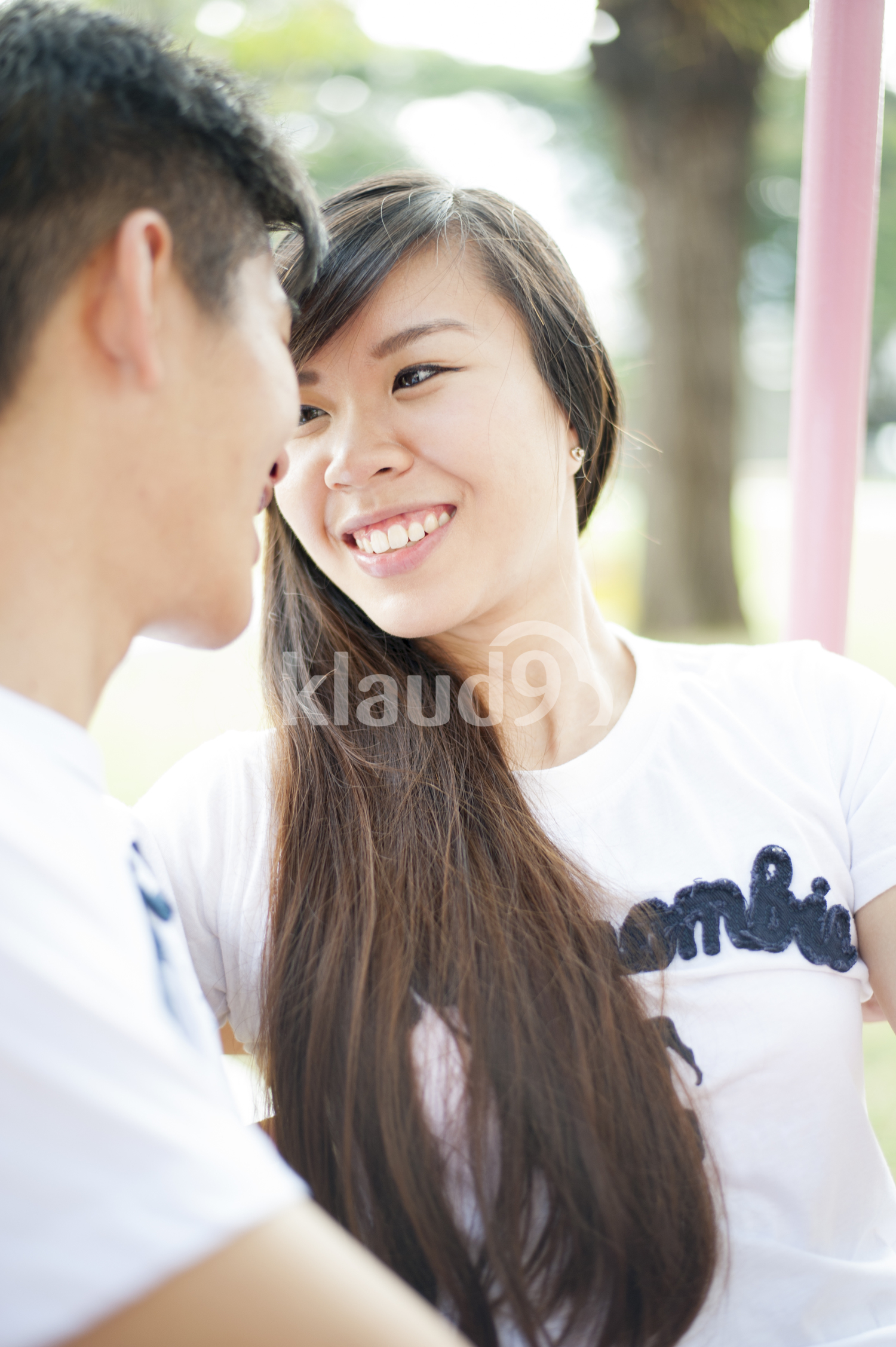 Woman smiling at her partner on a date