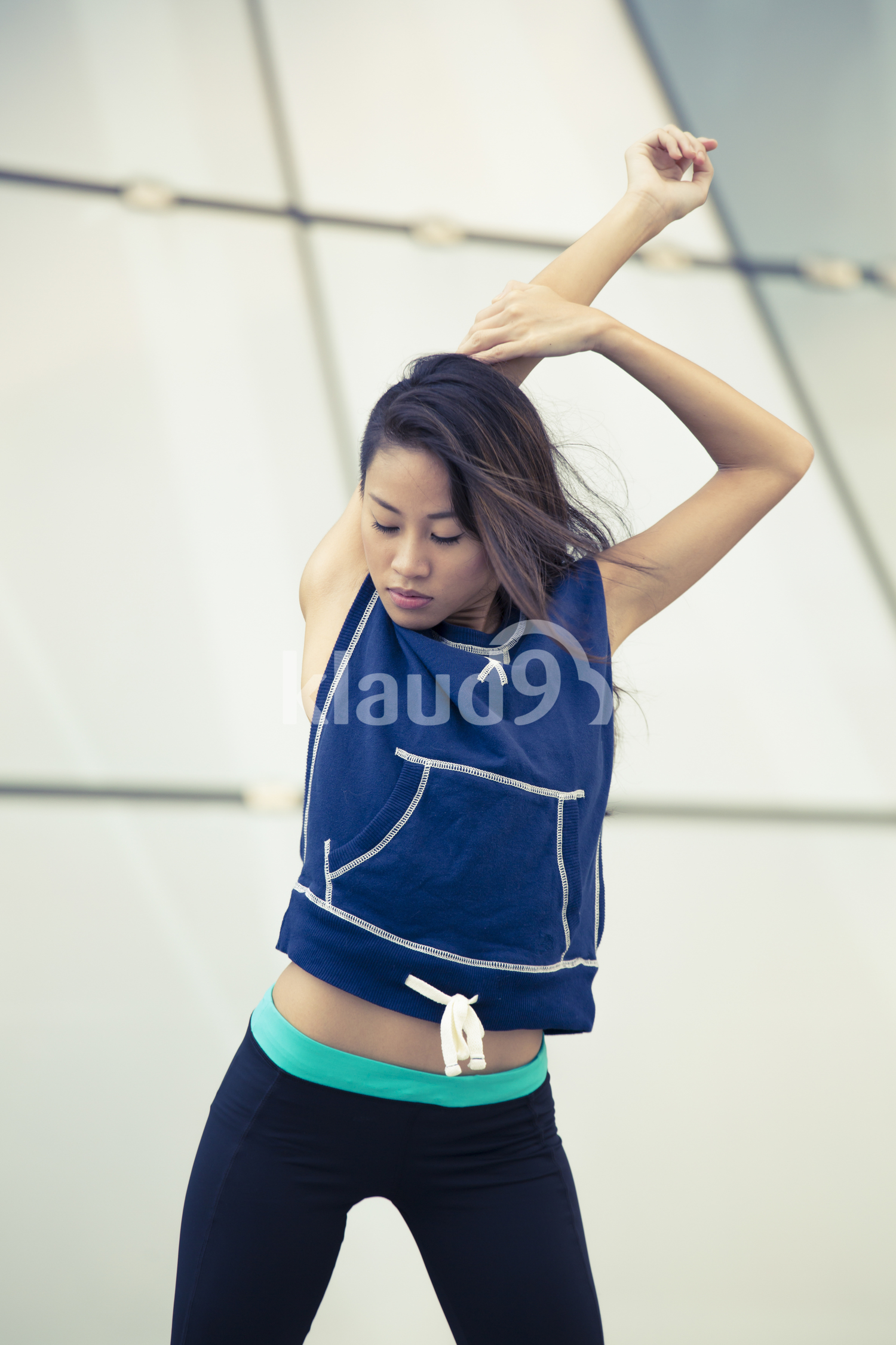 young asian woman stretching