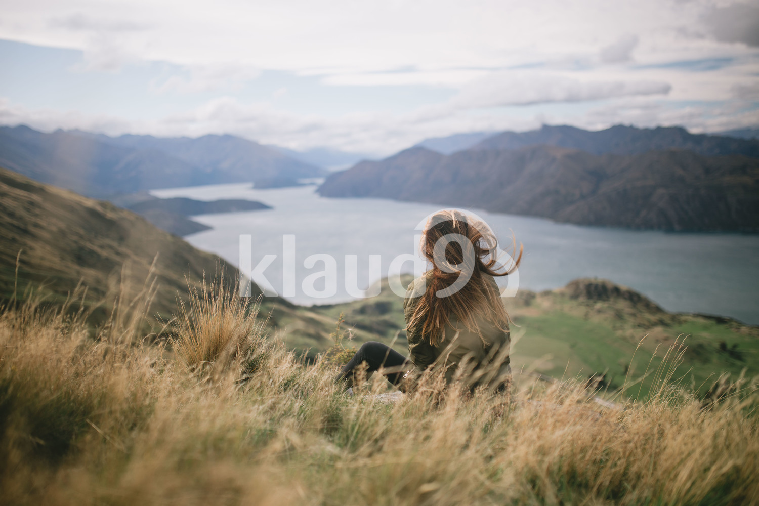 Young hipster woman enjoying herself at Mountain Cook National Park in New Zealand