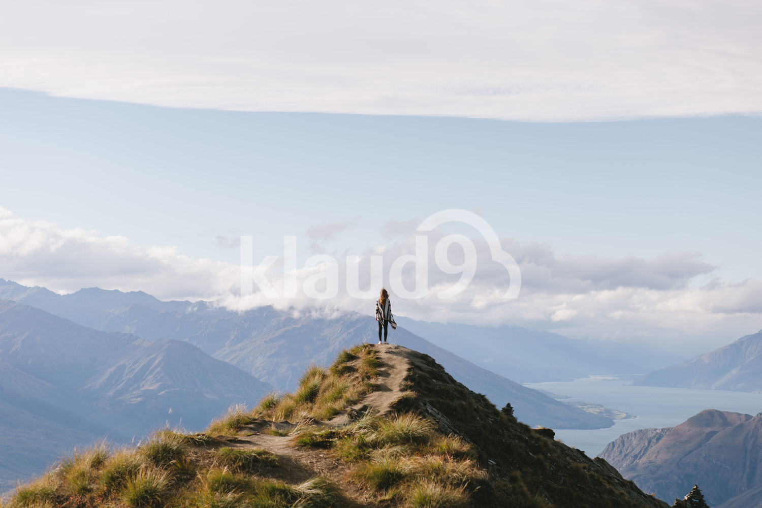 Young hipster woman enjoying herself at Mountain Cook National Park in New Zealand