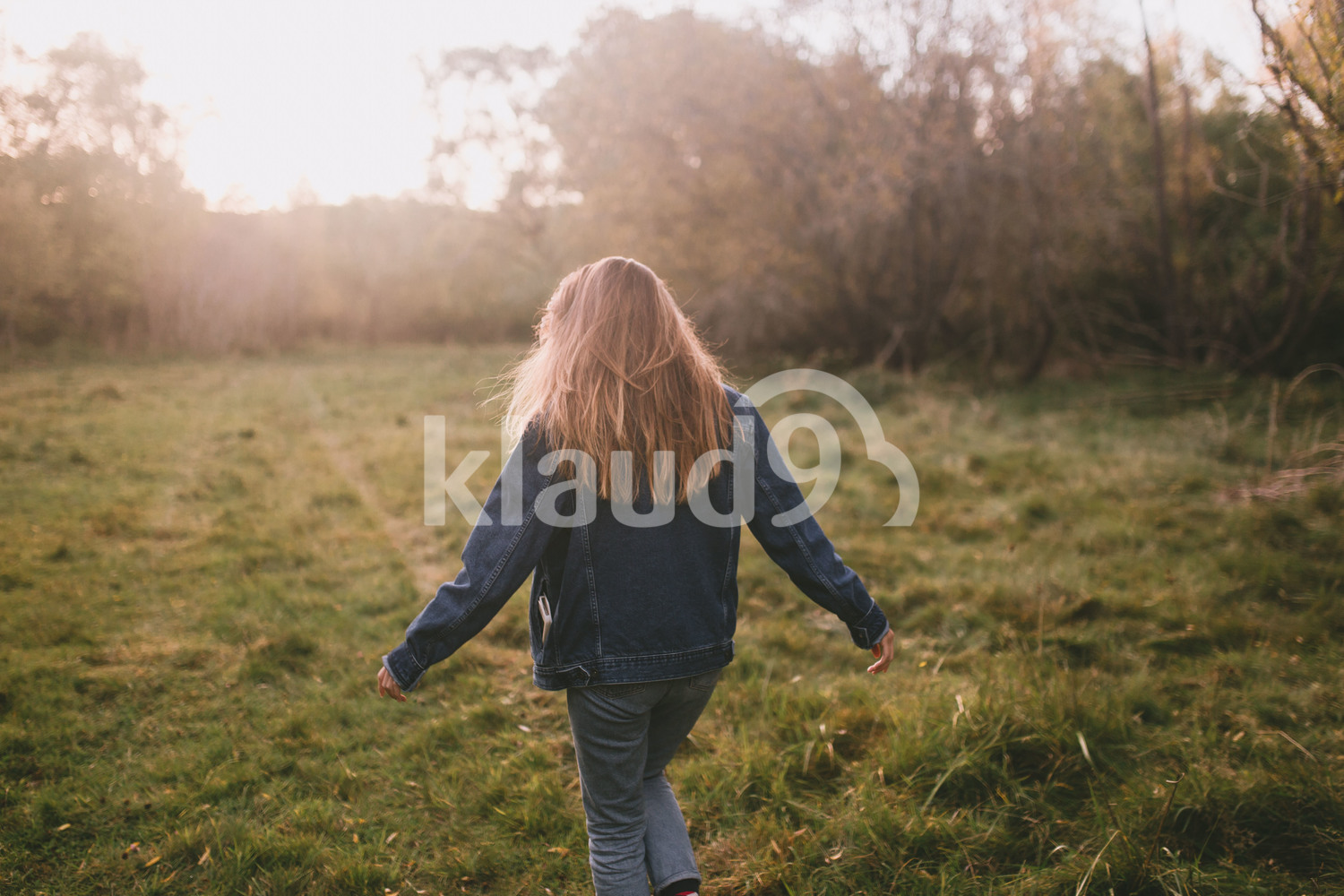 Young hipster woman enjoying herself at Mountain Cook National Park in New Zealand