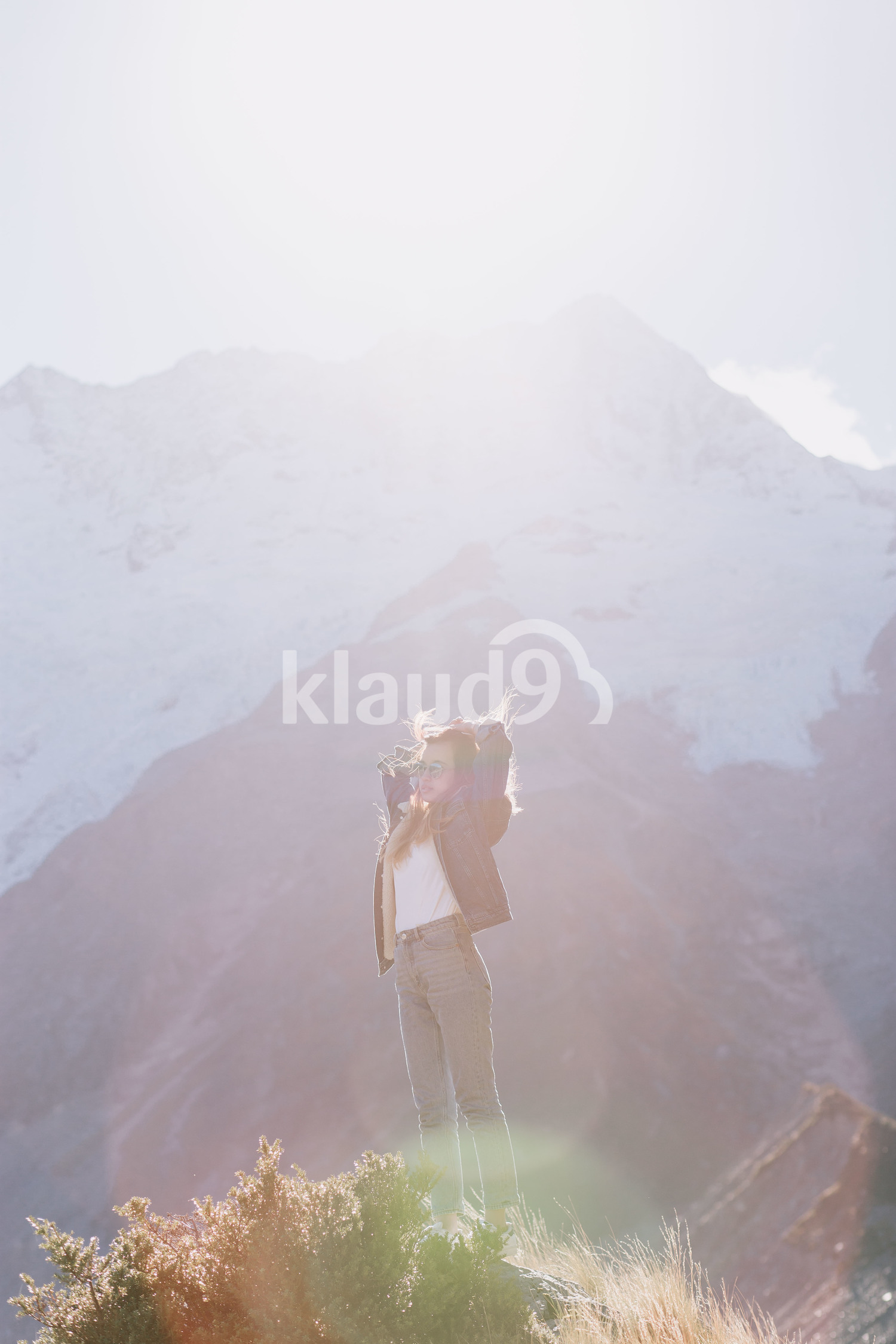 Young woman at Mountain Cook National Park in New Zealand