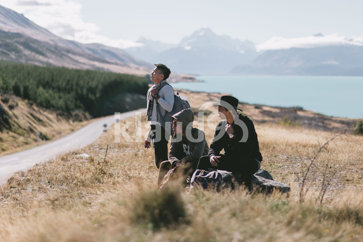 Group of friends enjoying the view at Milford Sound, New Zealand