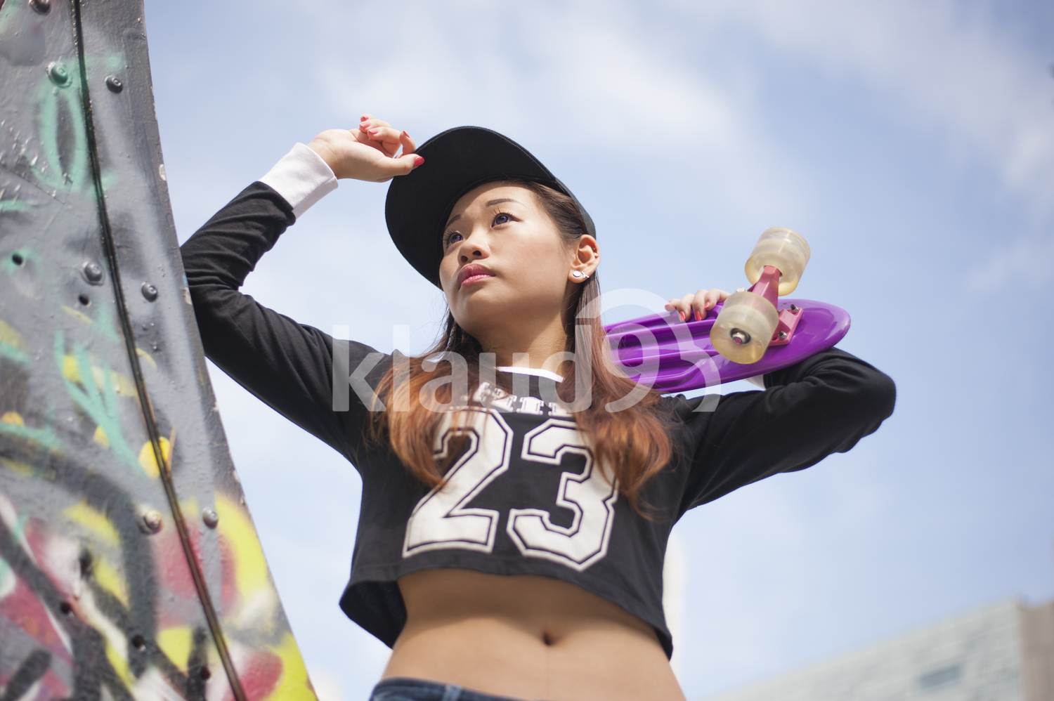 Portrait of a female youth at the skatepark