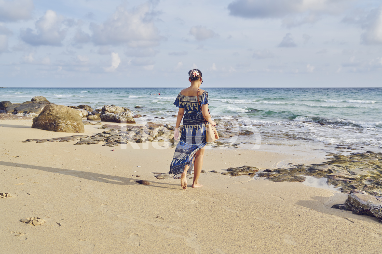 Back view of Young woman exploring the beach in Koh Kood, Thailand