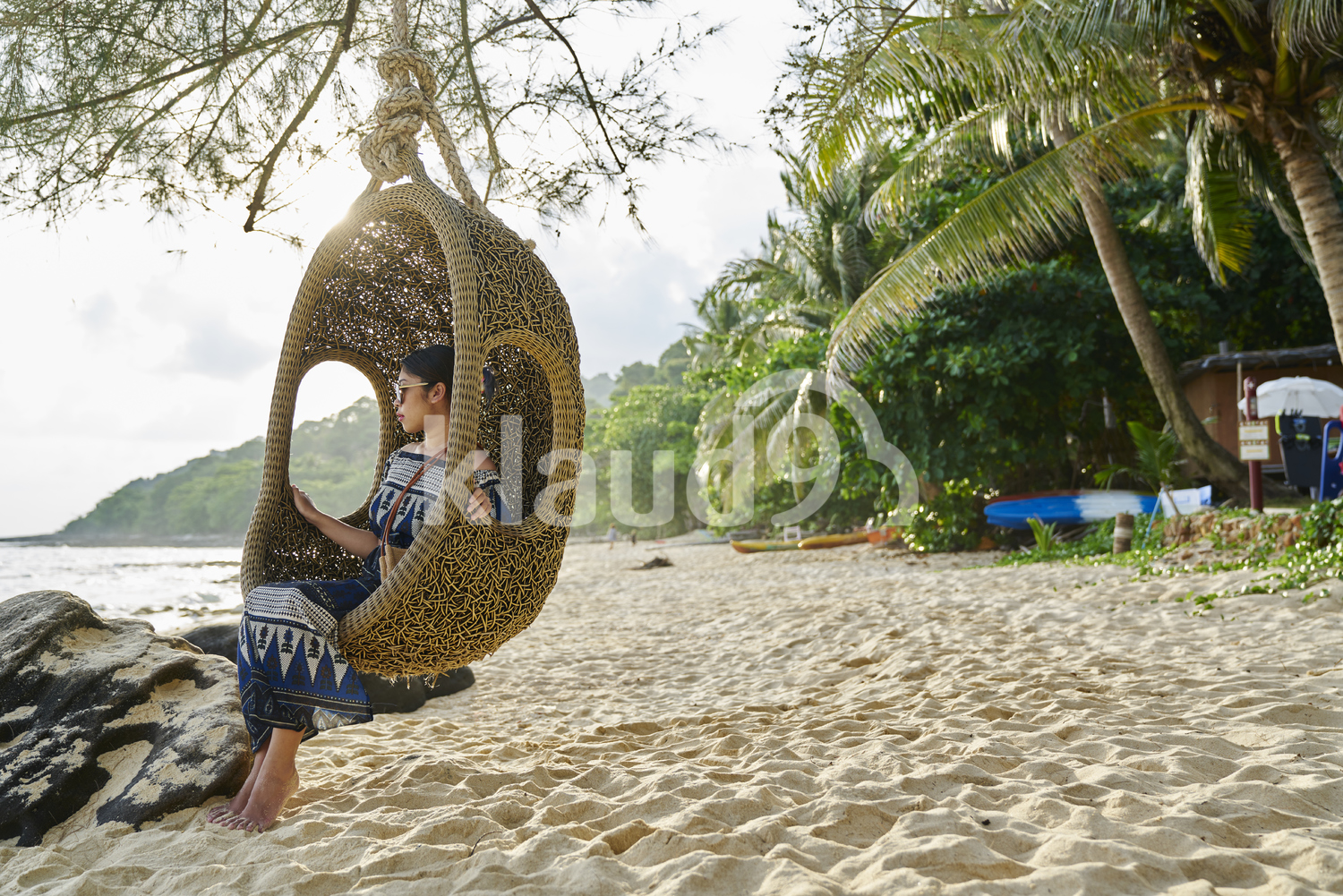 Young woman chilling by the beach in Koh Kood, Thailand 