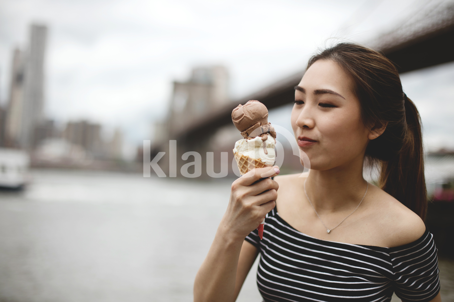 Ice cream cone melting, Pretty young asian eating an ice cream
