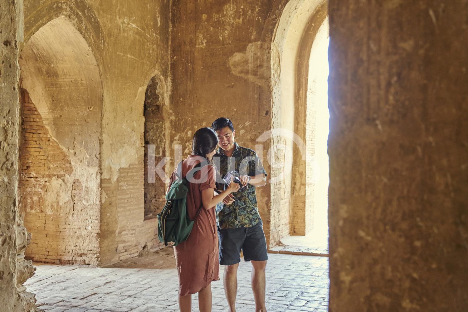 Young Couple Traveling Inside Of The Ancient Temple, Pagoda, Bagan, Myanmar