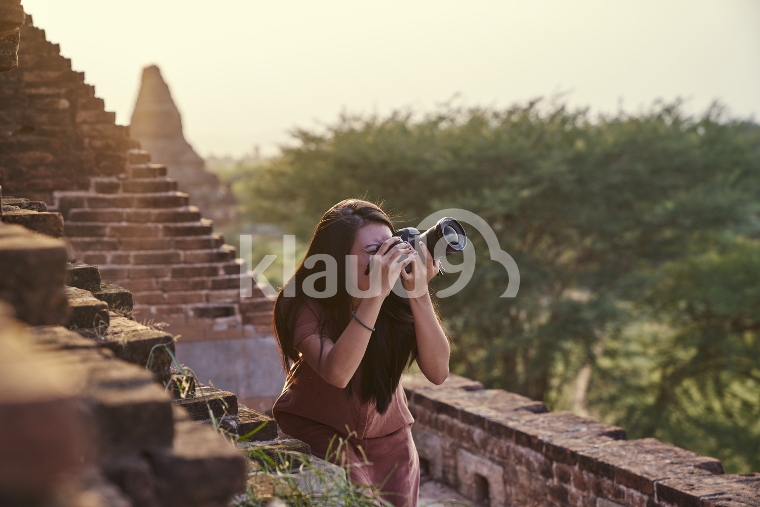 Young Lady Traveling Around The Ancient Pyathadar Temple, Bagan, Myanmar