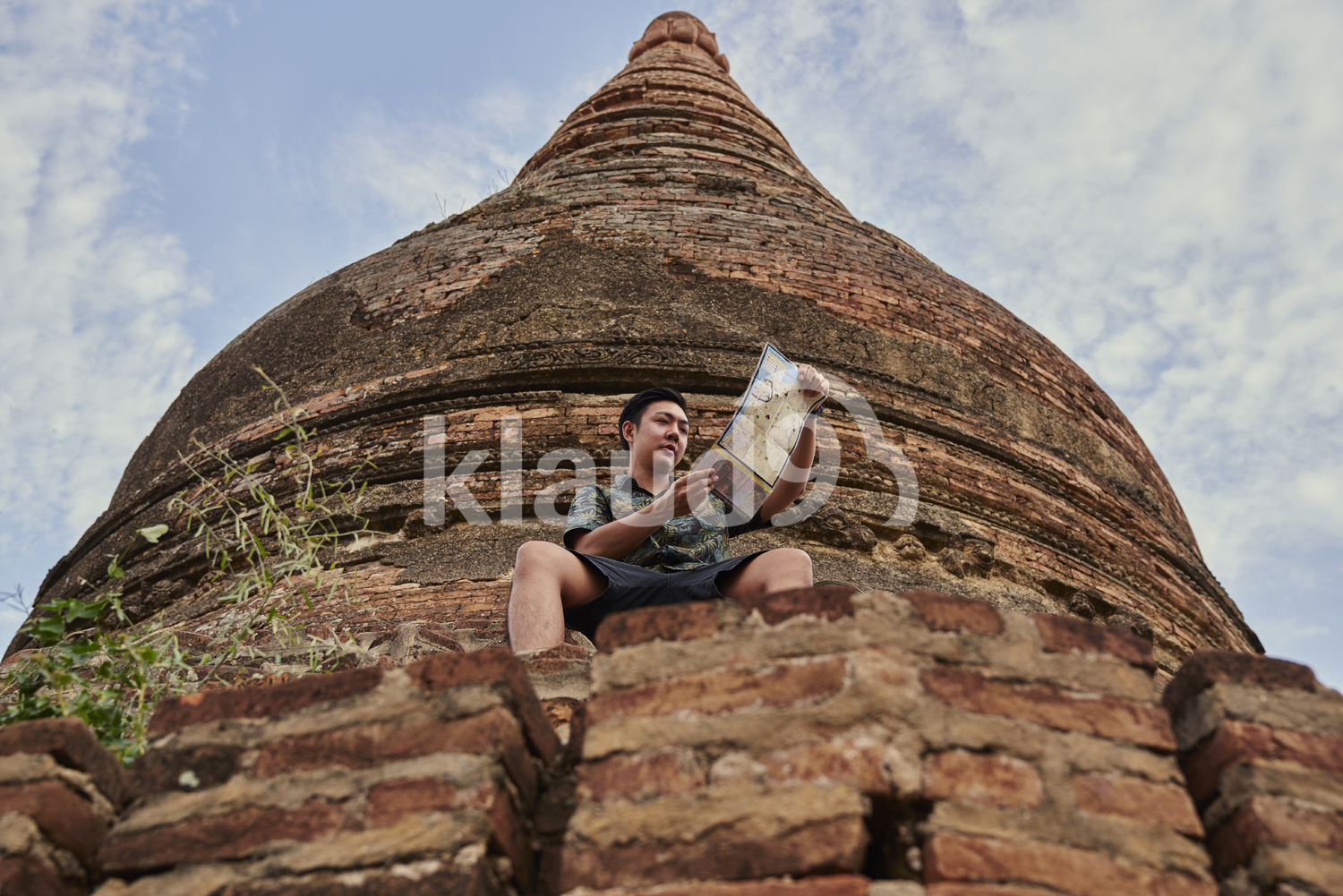Young Man Traveling Around The Ancient Pyathadar Temple, Bagan, Myanmar