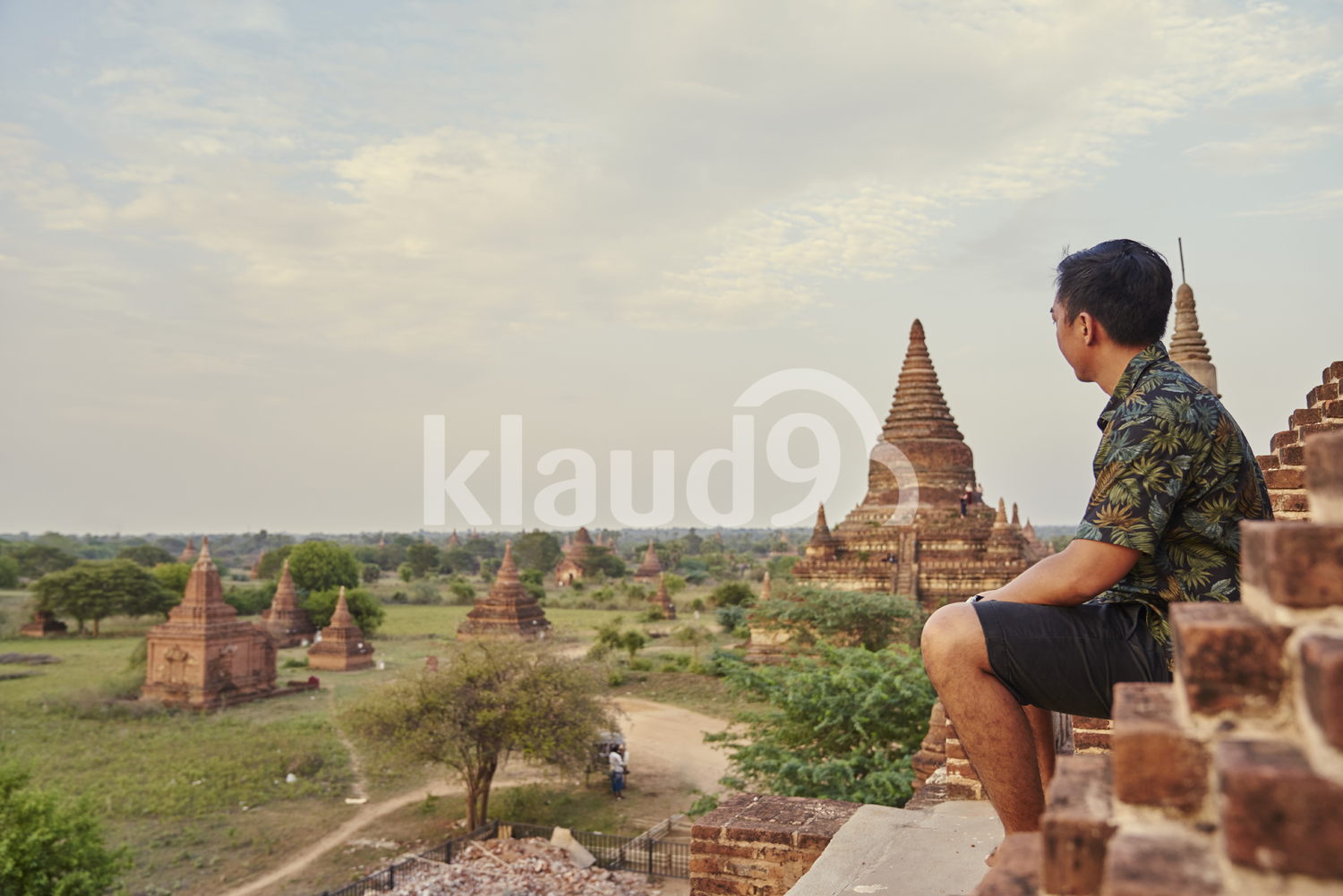 Young Man Chilling Around The Ancient Pyathadar Temple, Bagan, Myanmar