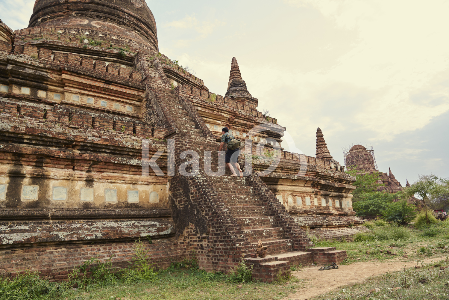 Young Man Traveling Around The Ancient Pyathadar Temple, Bagan, Myanmar