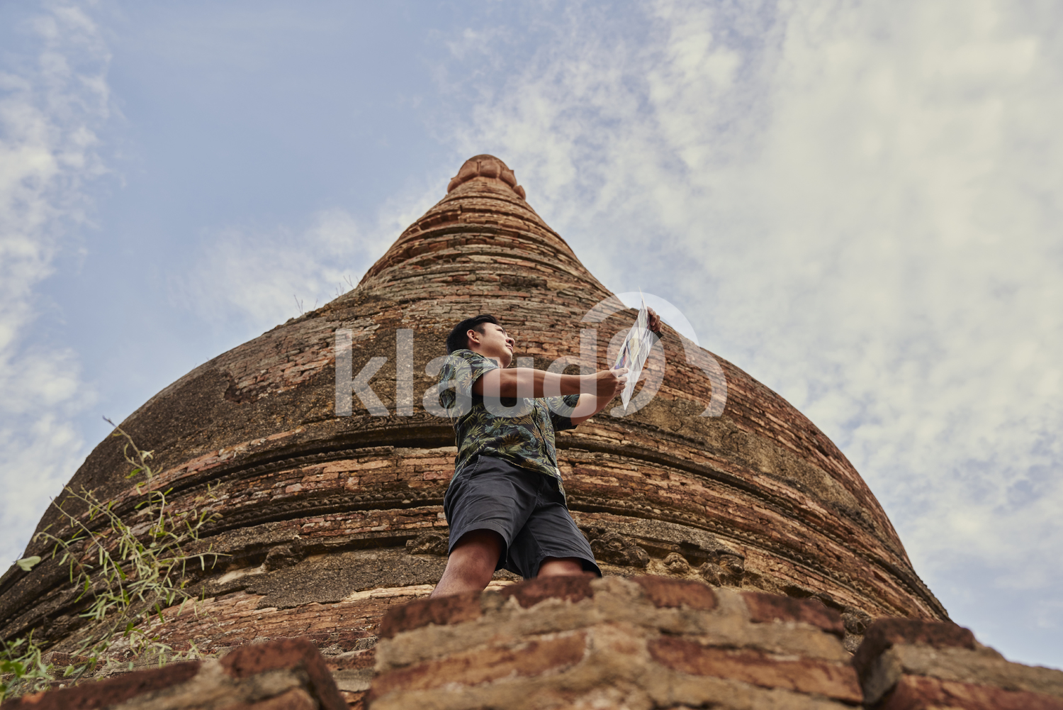 Young Man Traveling Around The Ancient Pyathadar Temple, Bagan, Myanmar
