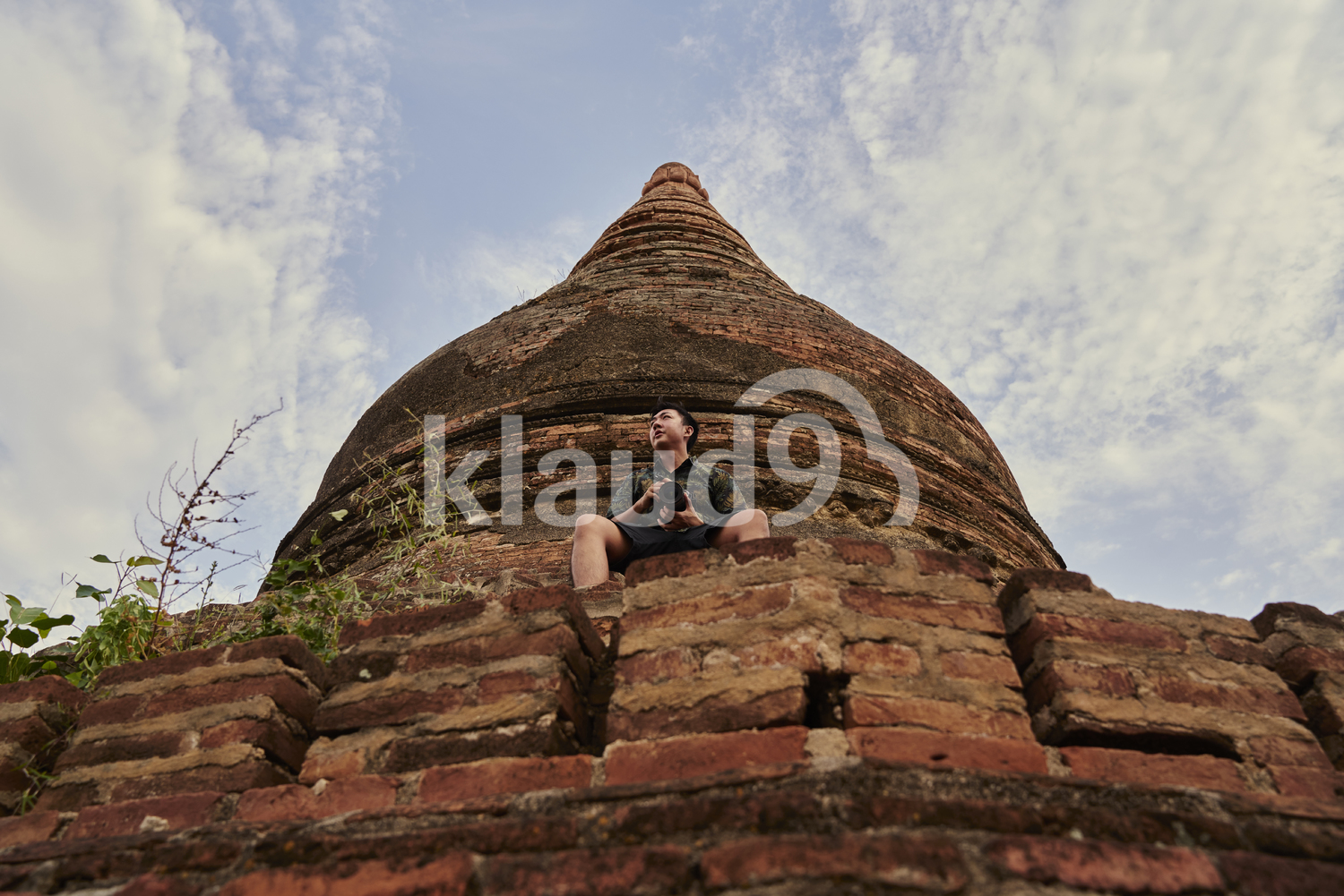 Young Man Traveling Around The Ancient Pyathadar Temple, Bagan, Myanmar