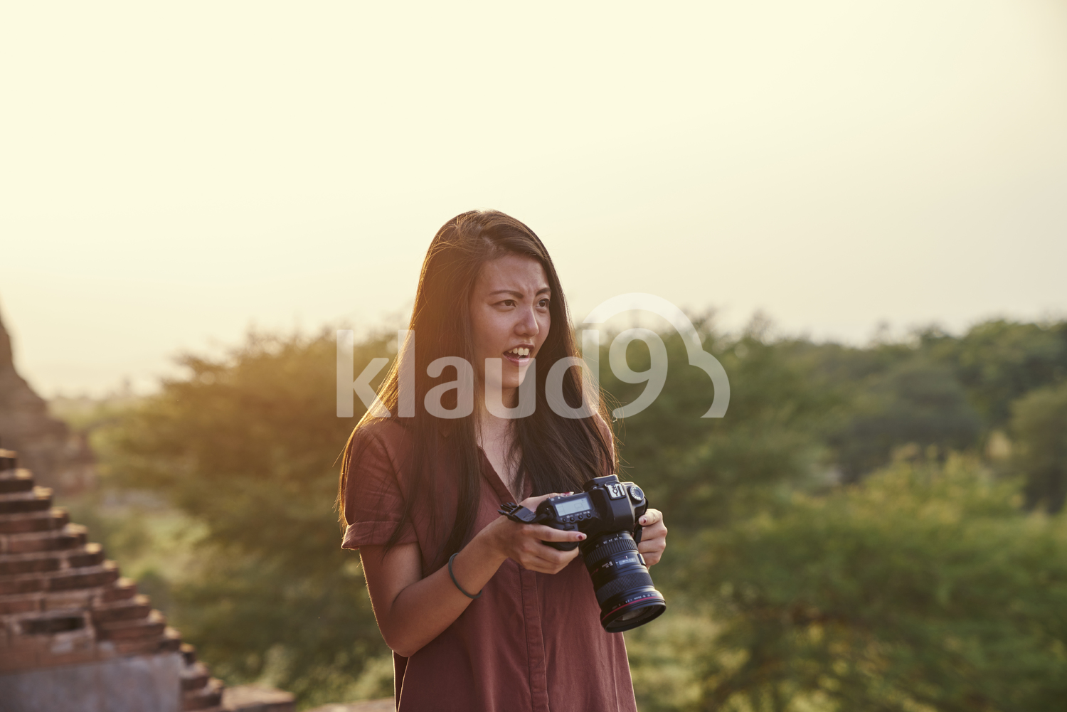 Young Lady Traveling Around The Ancient Pyathadar Temple, Bagan, Myanmar