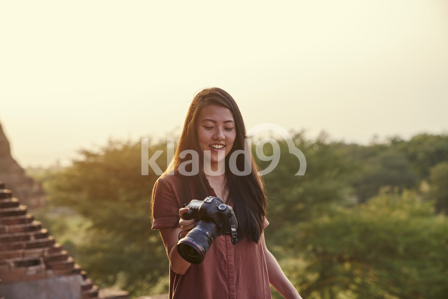 Young Lady Traveling Around The Ancient Pyathadar Temple, Bagan, Myanmar