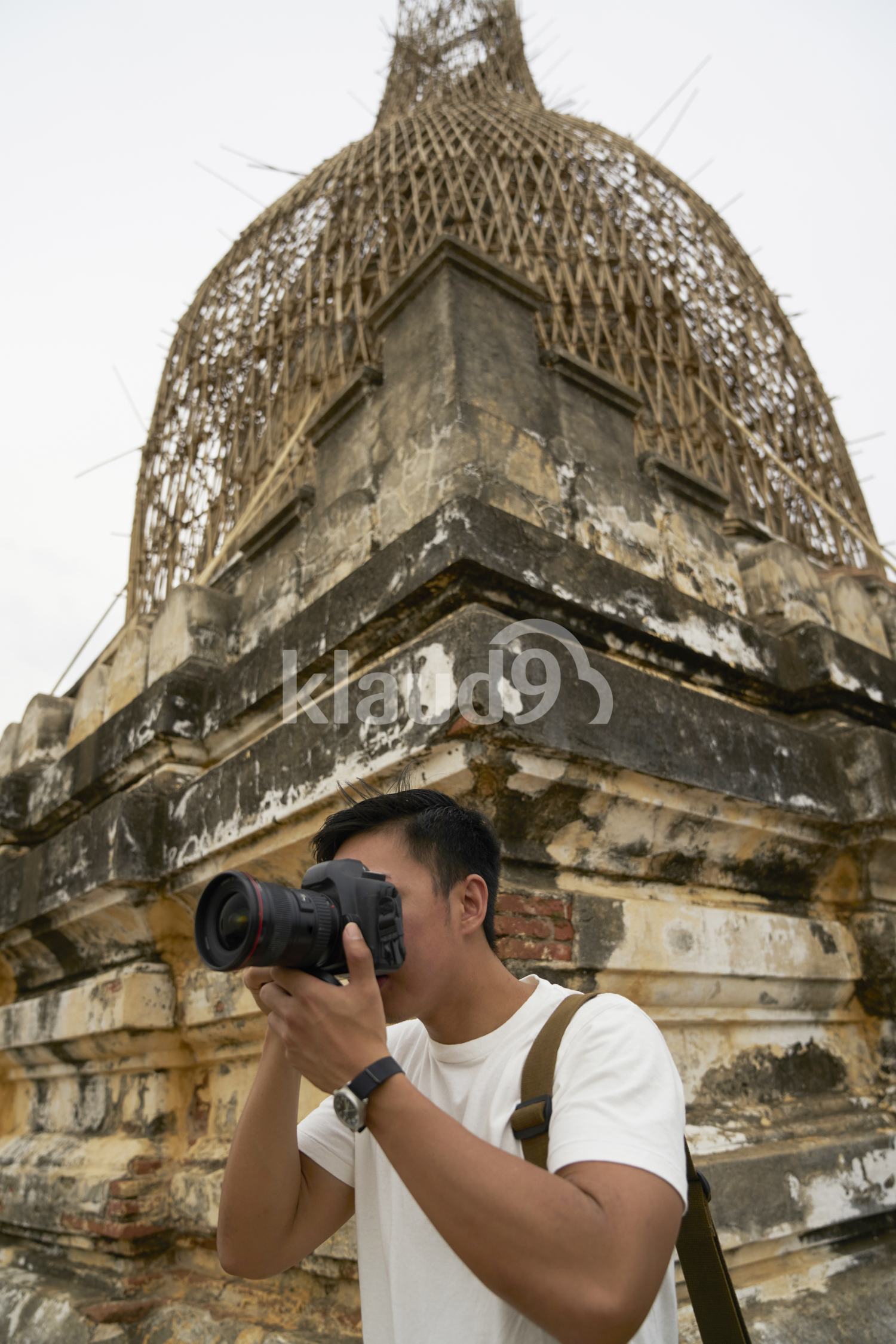 Young Man Taking Photos At Shwesandaw Pagoda (Bagan, Myanmar)