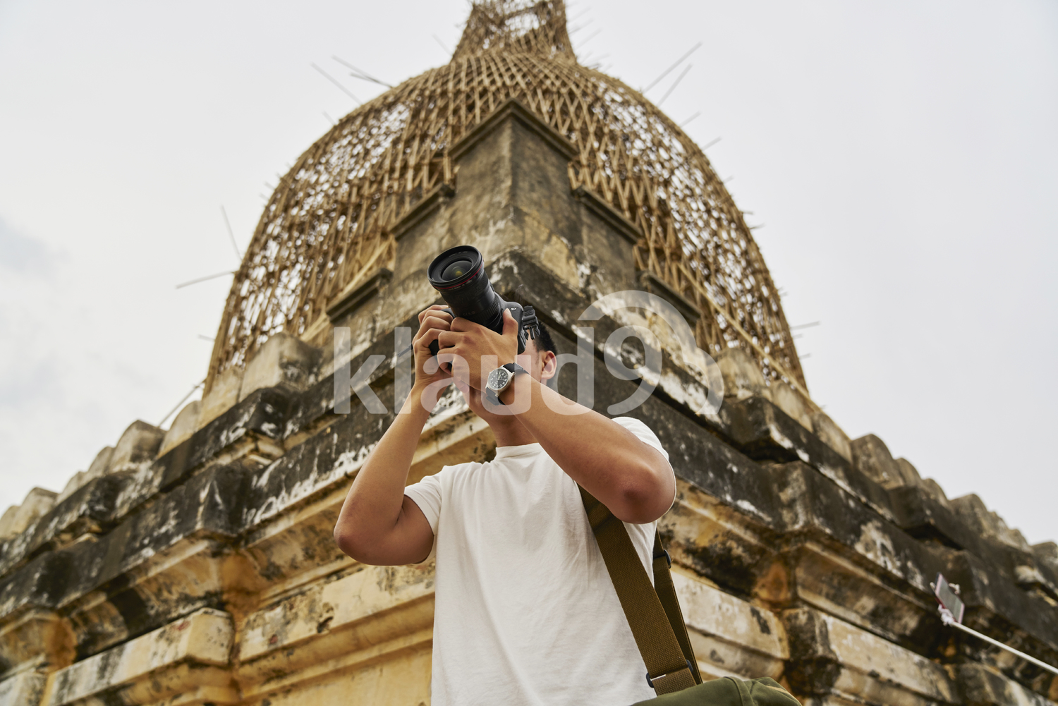 Young Man Taking Photos At Shwesandaw Pagoda (Bagan, Myanmar)