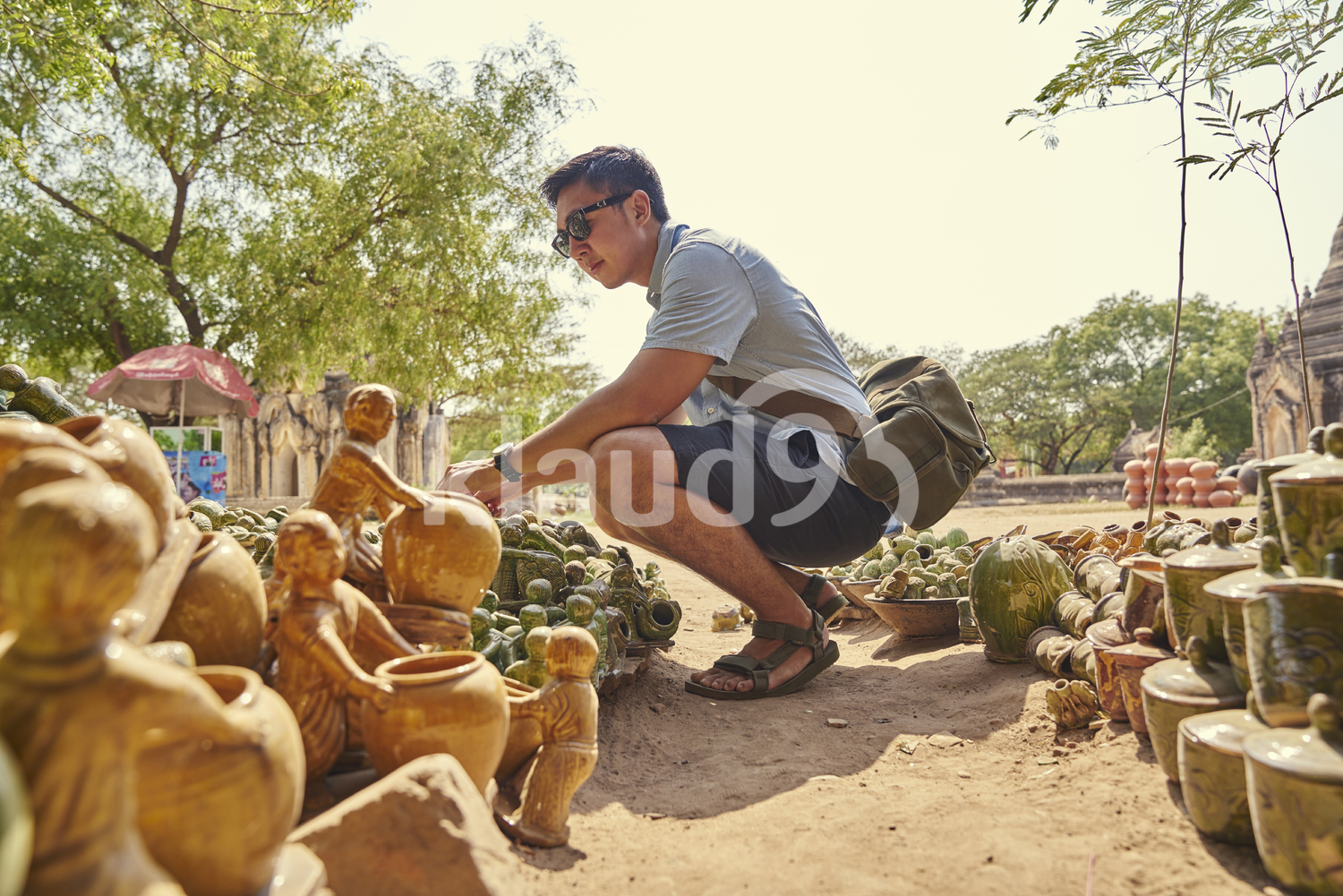 Young Man Browsing Through The Roadside Stall, Bagan Myanmar