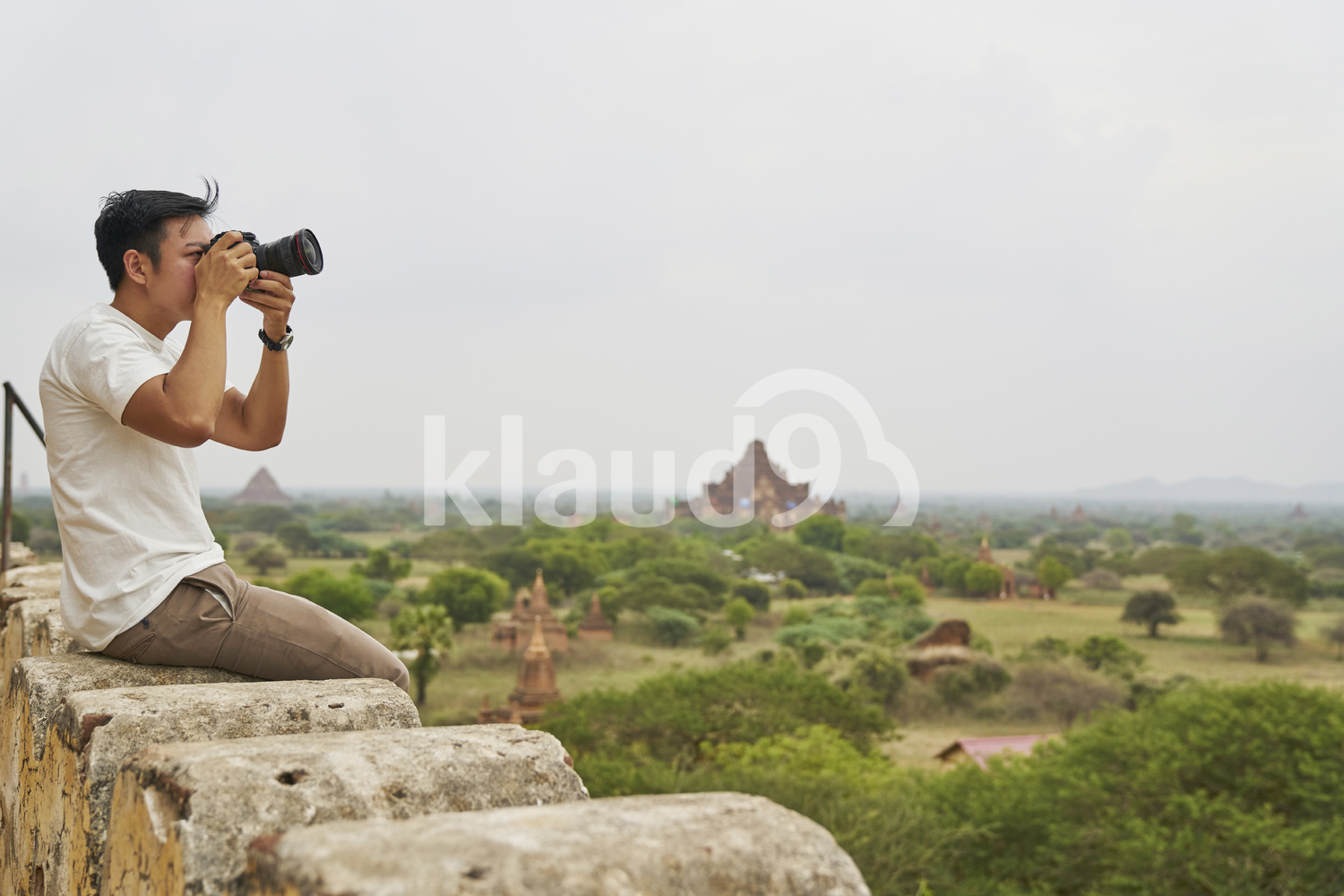 Young Man Taking Photos At Shwesandaw Pagoda (Bagan, Myanmar)