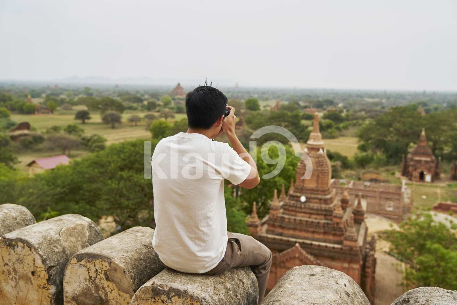 Young Man Taking Photos At Shwesandaw Pagoda (Bagan, Myanmar)