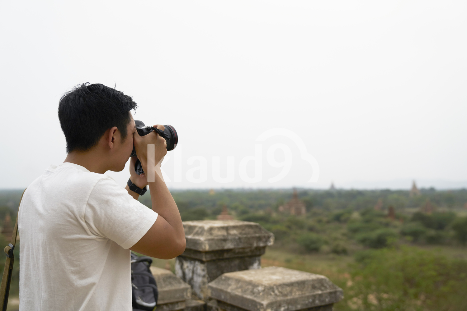 Young Man Taking Photos At Shwesandaw Pagoda (Bagan, Myanmar)