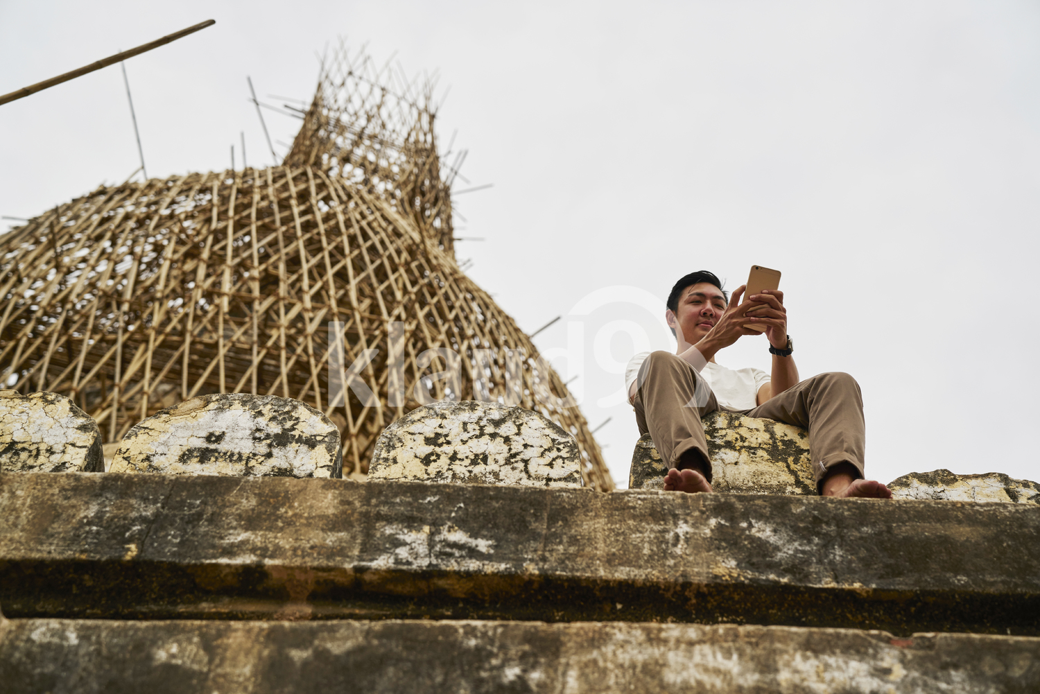 Young Man Taking Photos At Shwesandaw Pagoda (Bagan, Myanmar)