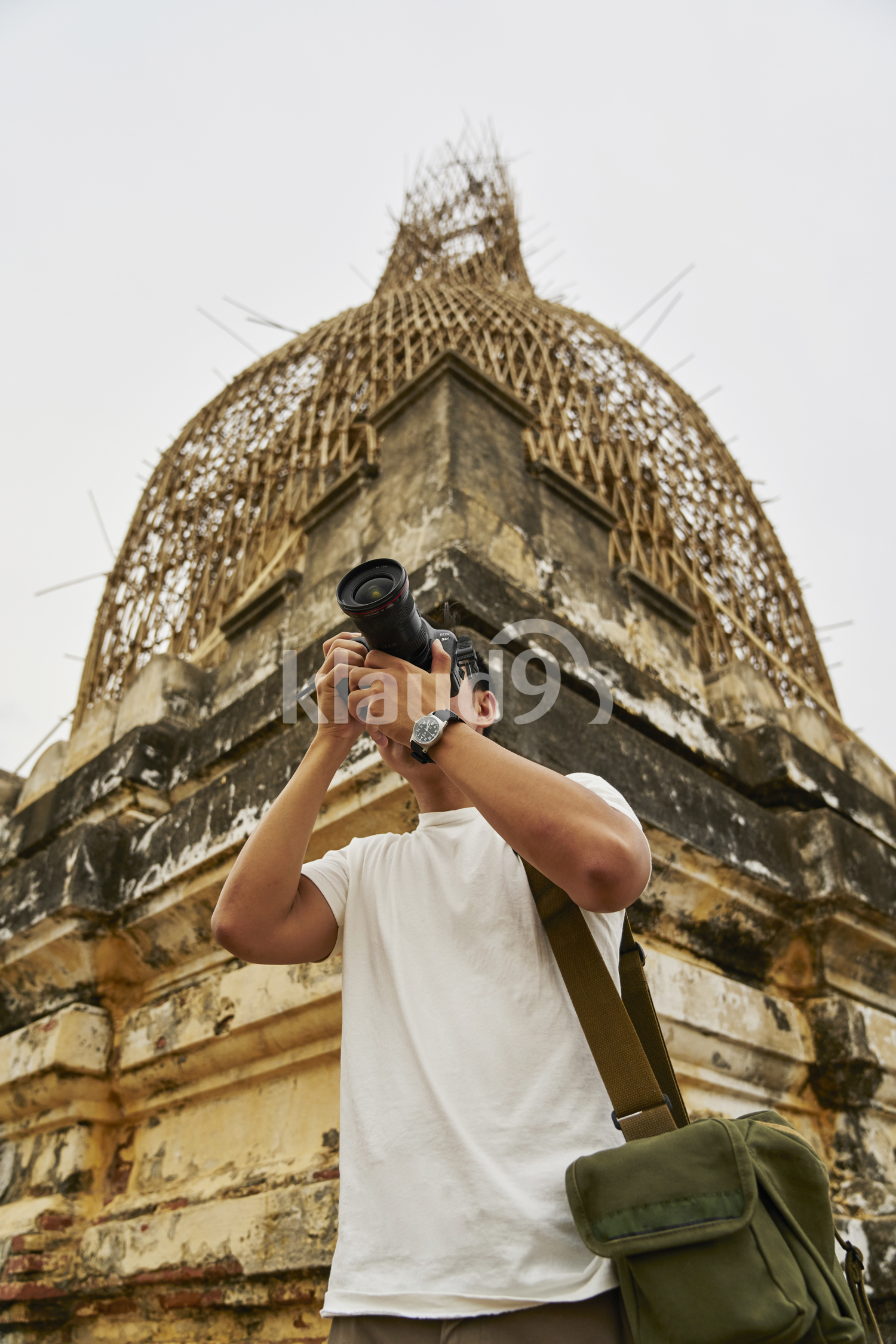 Young Man Taking Photos At Shwesandaw Pagoda (Bagan, Myanmar)