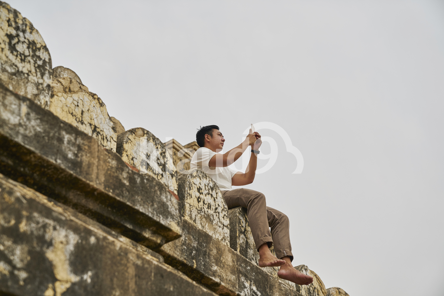 Young Man Taking Photos At Shwesandaw Pagoda (Bagan, Myanmar)