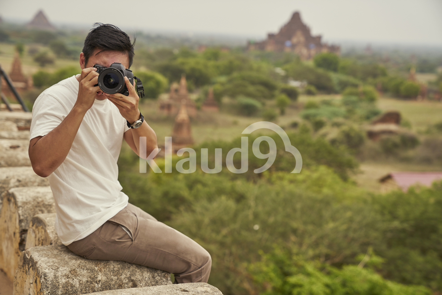 Young Man Taking Photos At Shwesandaw Pagoda (Bagan, Myanmar)