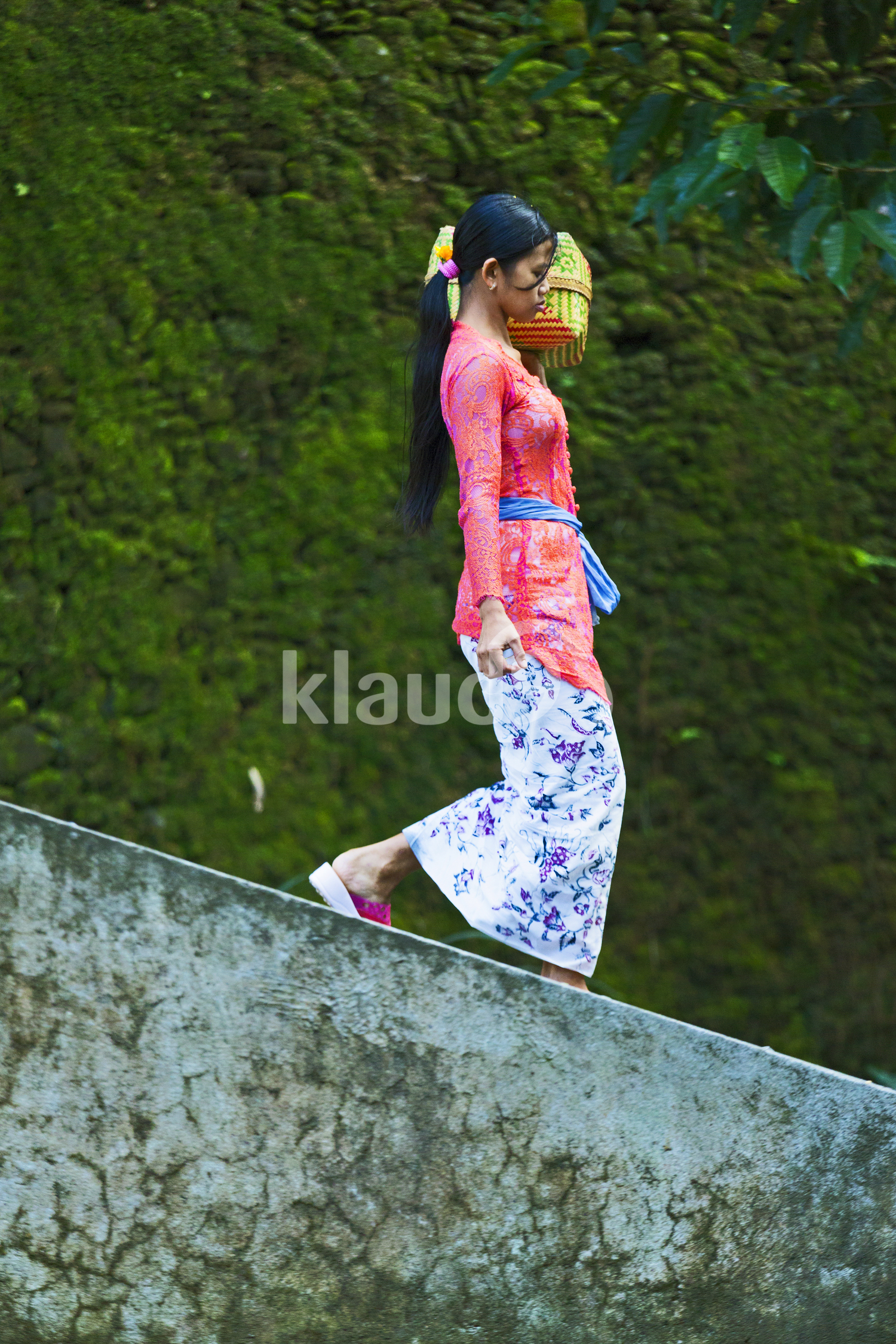 Balinese woman with offerings